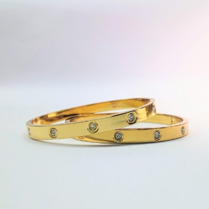 pair of studded cartier band